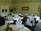 White Chair Covers and Chocolate Taffeta Sash